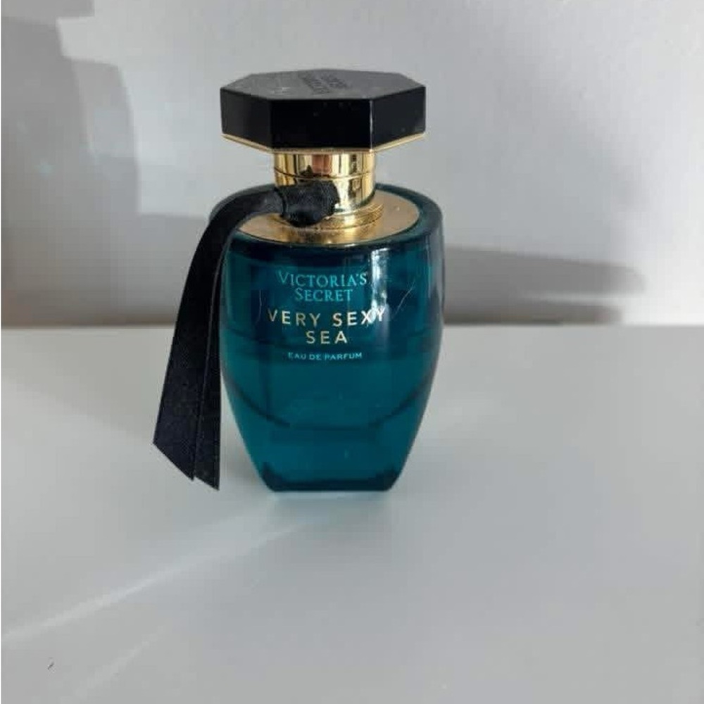 Victoria's Secret Teal Fragrance Bottle with Black Cap